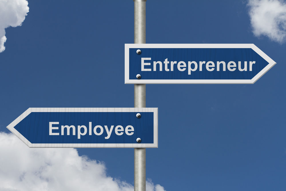 signs with entrepreneur and employee on it