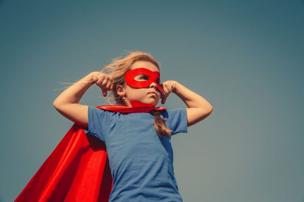 child dressed as a super-hero